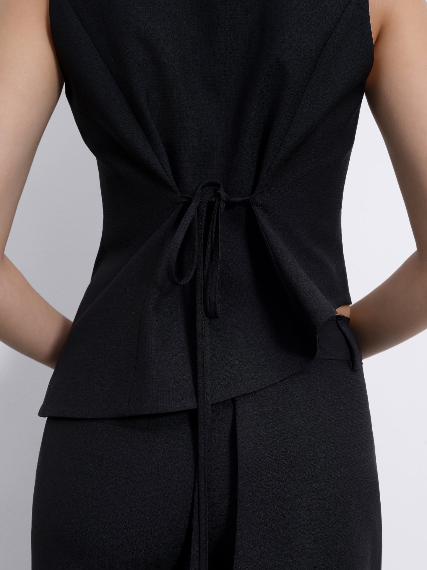 Calin Asymmetric Back-Tie Button Vest — Black