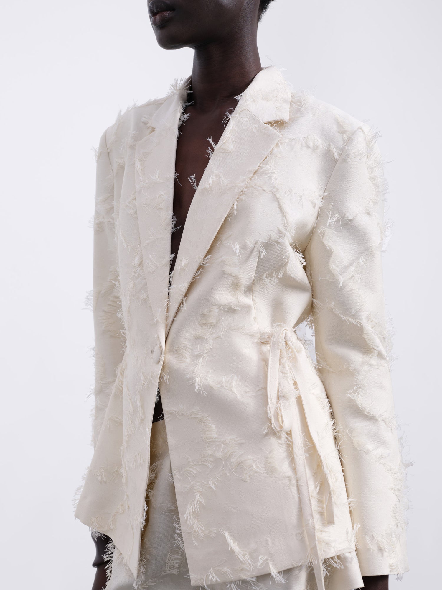 Jora Fringe Textured Open-Back Blazer — Cream